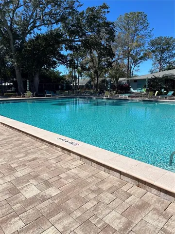 a view of a lake with a yard