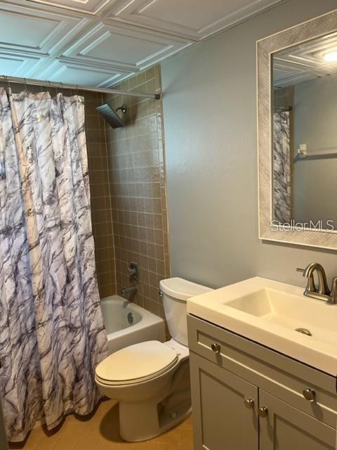 3300 Fox Chase Circle, Unit 226 Palm Harbor, FL 34683 - Photo 4 of 13 a bathroom with a sink toilet and shower