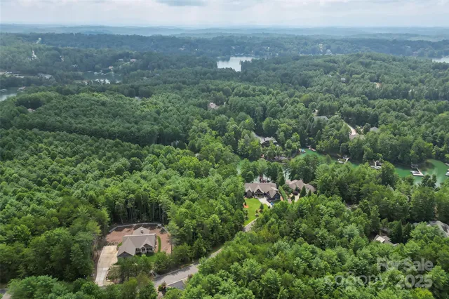 an aerial view of residential house with outdoor space