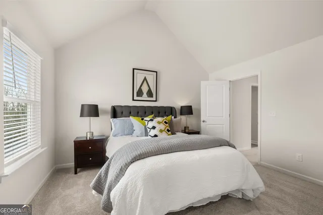 a bathroom with a bathtub and a toilet