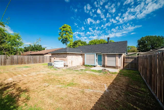 a house view with a garden space