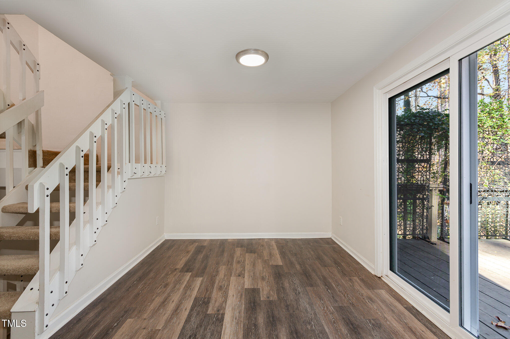 7324 Summerland Drive Raleigh, NC 27612 - Photo 11 of 24 a view of entryway with wooden floor