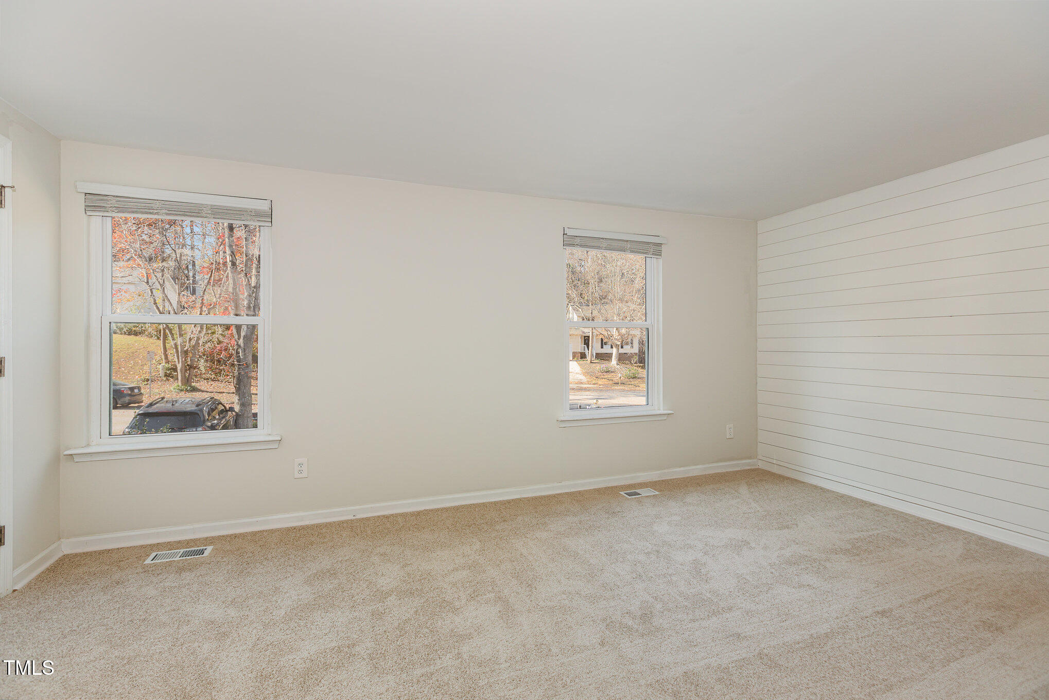 7324 Summerland Drive Raleigh, NC 27612 - Photo 13 of 24 an empty room with windows