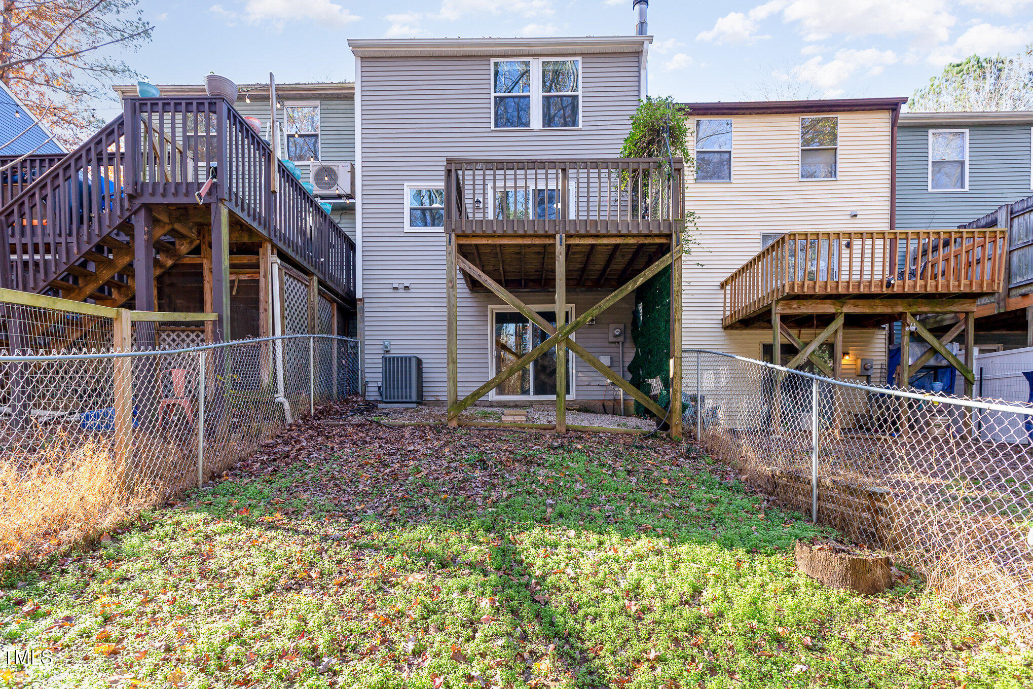7324 Summerland Drive Raleigh, NC 27612 - Photo 23 of 24 a view of a house with a yard