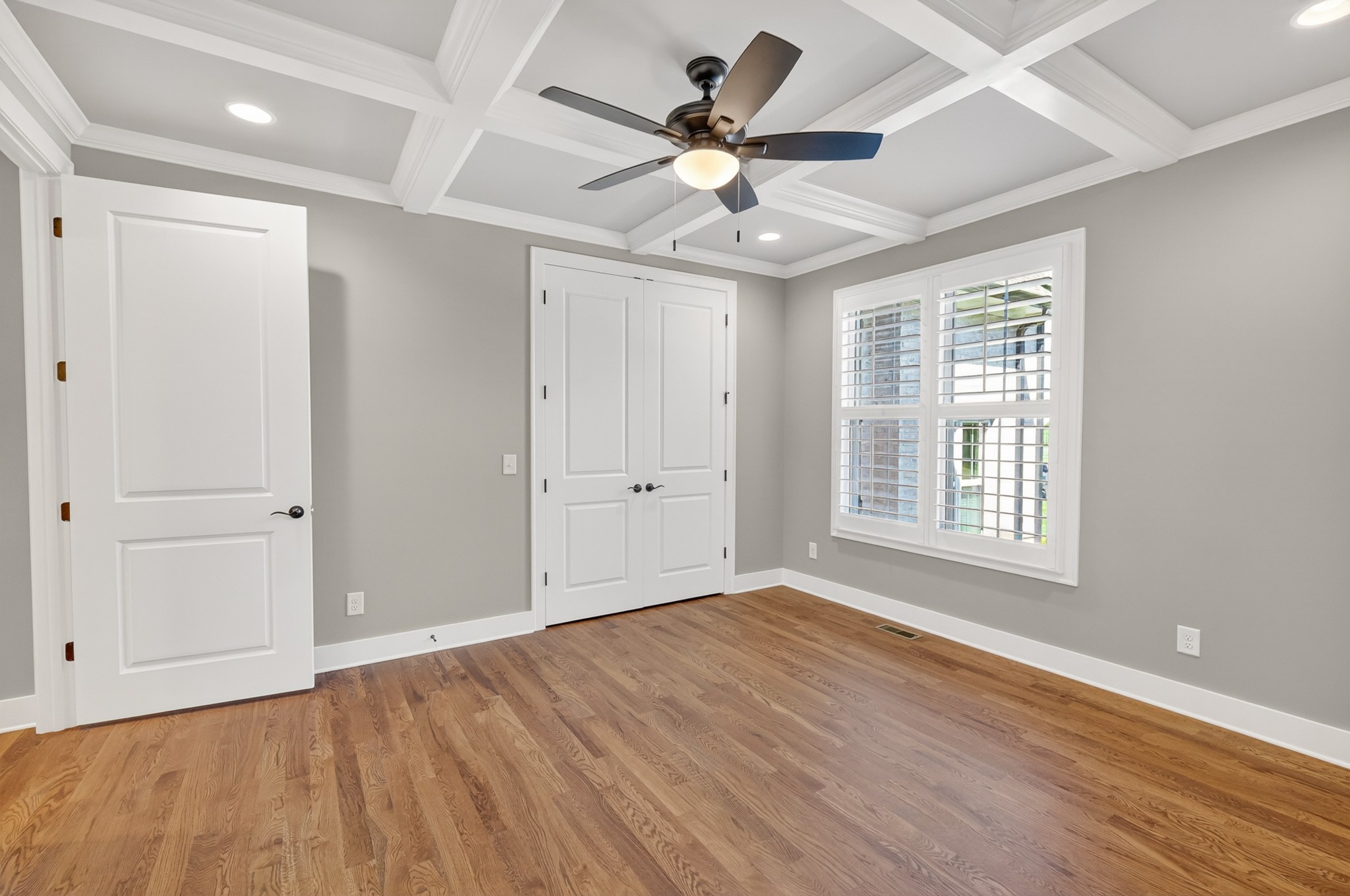 1176 Iron Bridge Road Columbia, TN 38401 - Photo 25 of 53 a view of an empty room with a window and a ceiling fan