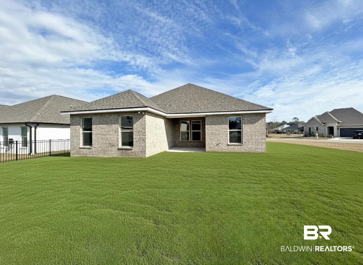 825 Sumter Loop Foley, AL 36535 - Photo 18 of 21 Rear view of house with a patio area, brick siding, and a shingled roof