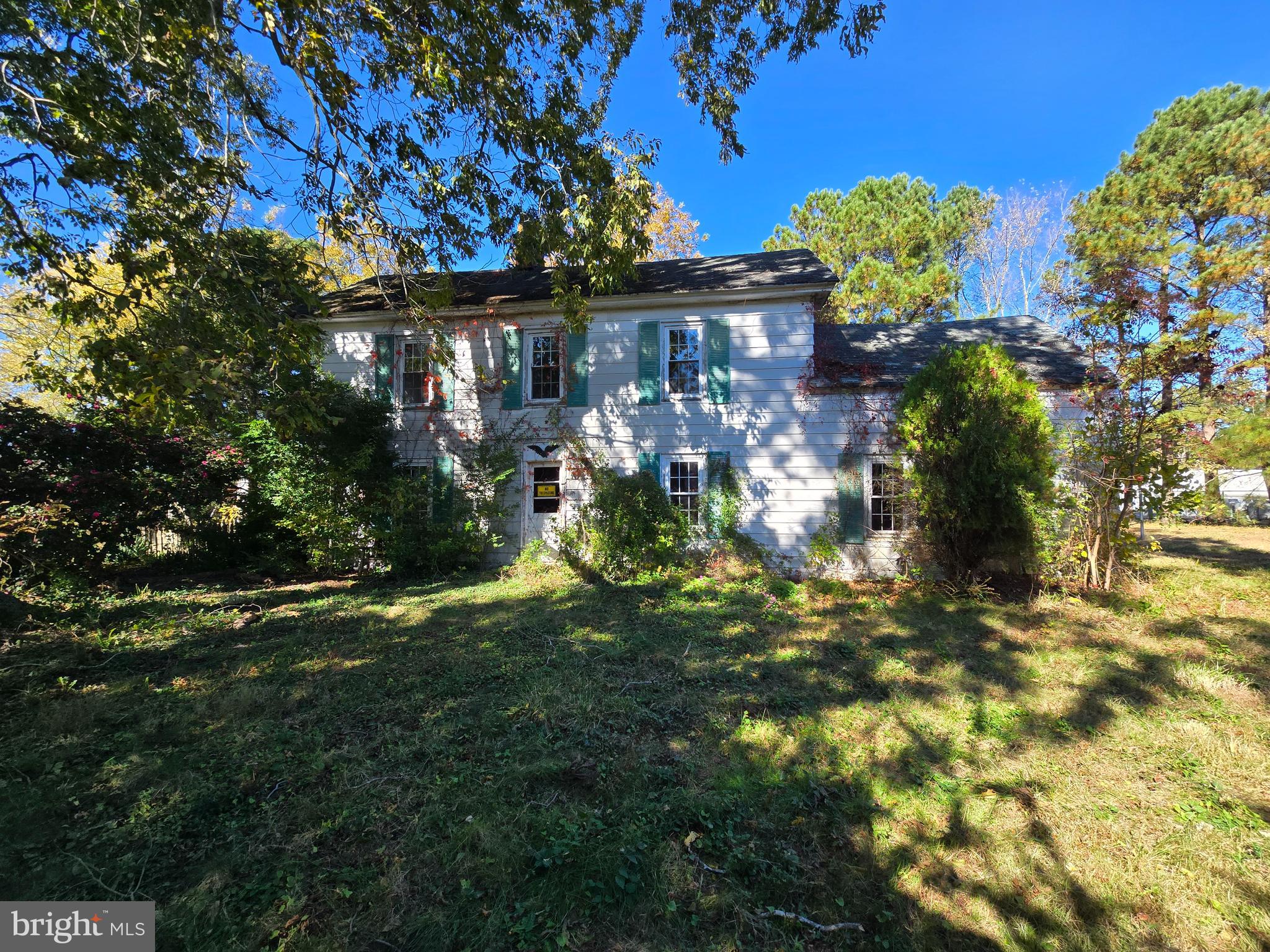 26934 Old State Road Crisfield, MD 21817 - Photo 15 of 15 a view of a house with a big yard and large tree