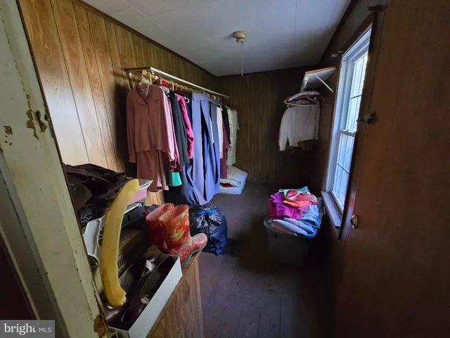 a view of livingroom with furniture and a fireplace