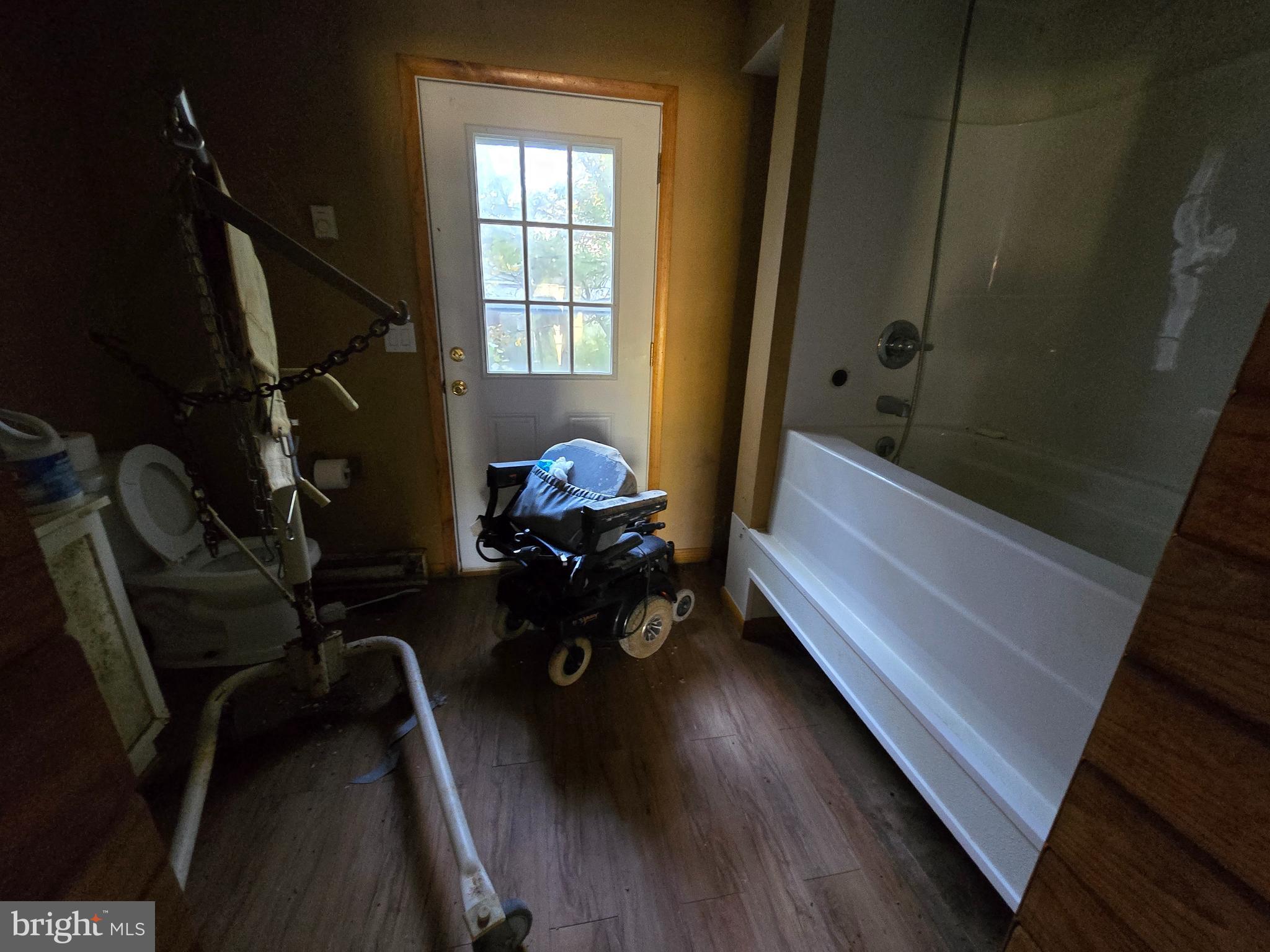 26934 Old State Road Crisfield, MD 21817 - Photo 8 of 15 a view of a room with furniture and a window