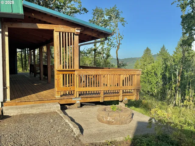 a view of balcony with wooden floor