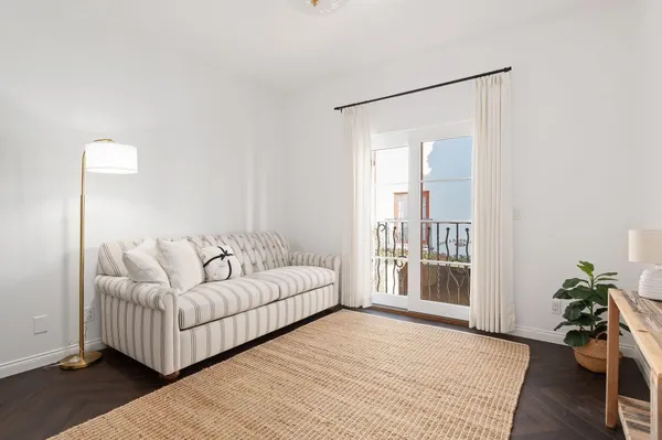 a view of a hallway with washer and dryer
