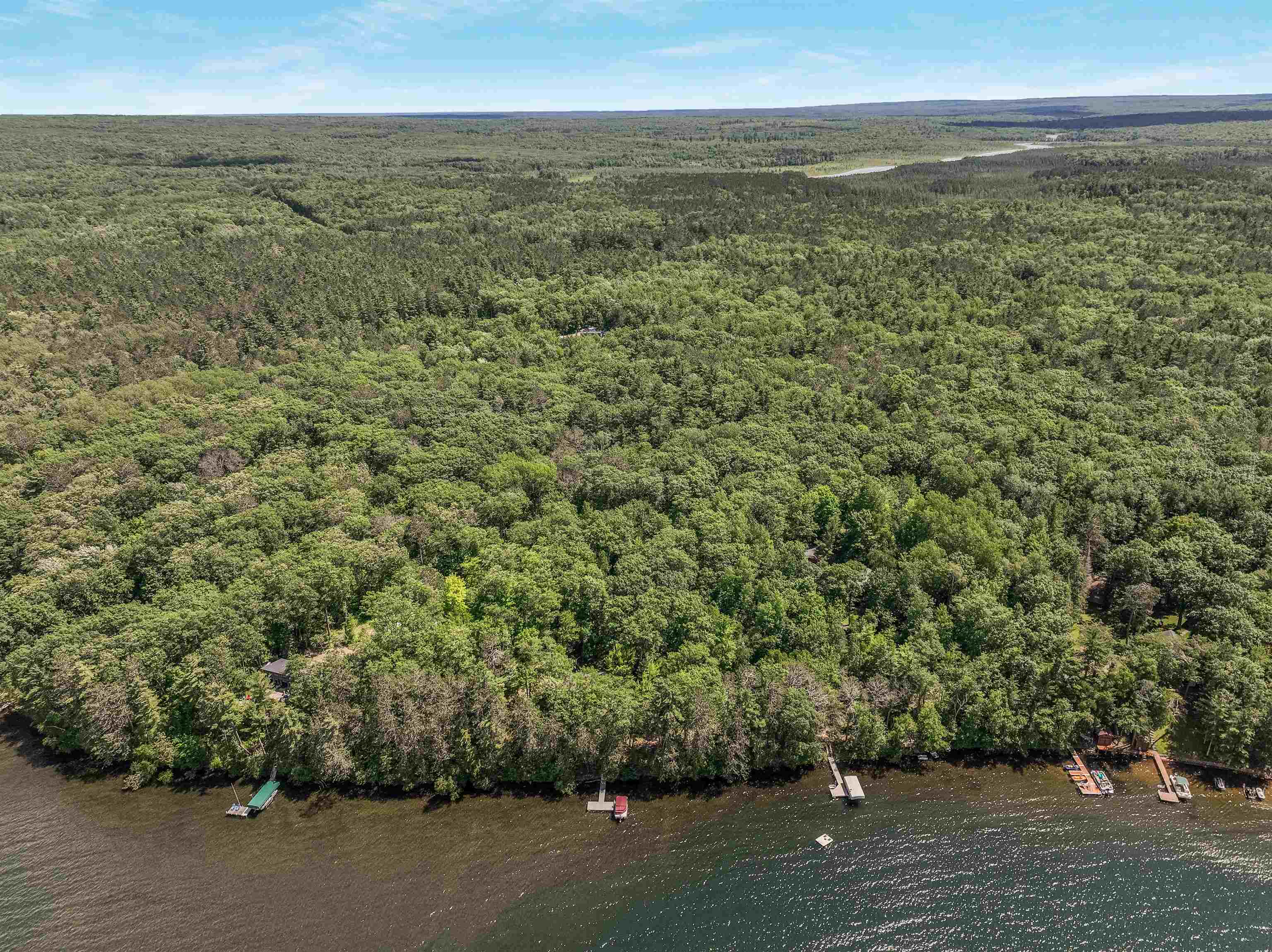 Lot 1 Thoroughfare Road Stone Lake, WI 54876 - Photo 6 of 12 Aerial view of property and surrounding area featuring a forest