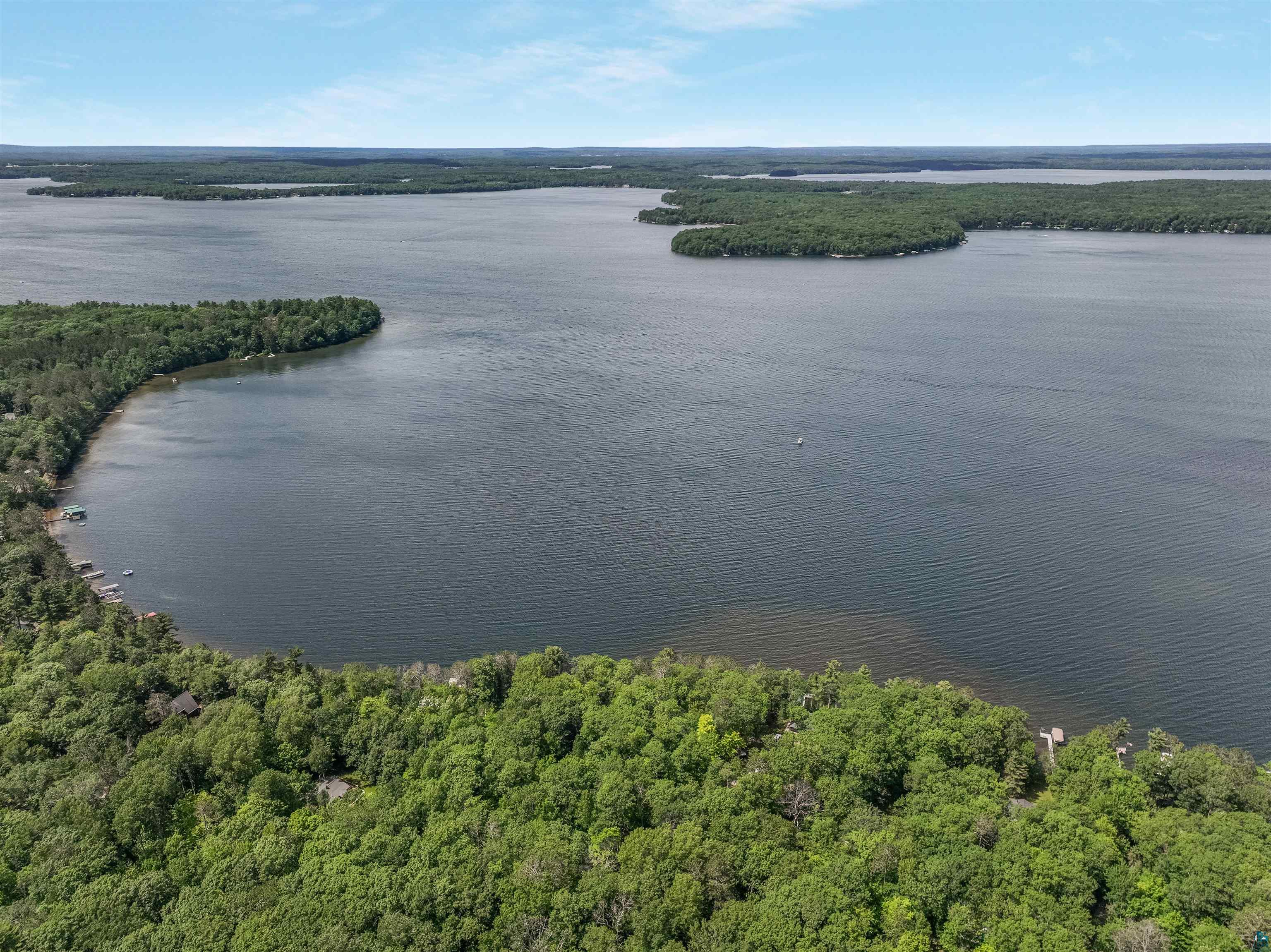 Lot 1 Thoroughfare Road Stone Lake, WI 54876 - Photo 7 of 12 Bird's eye view of a nearby body of water and a forest