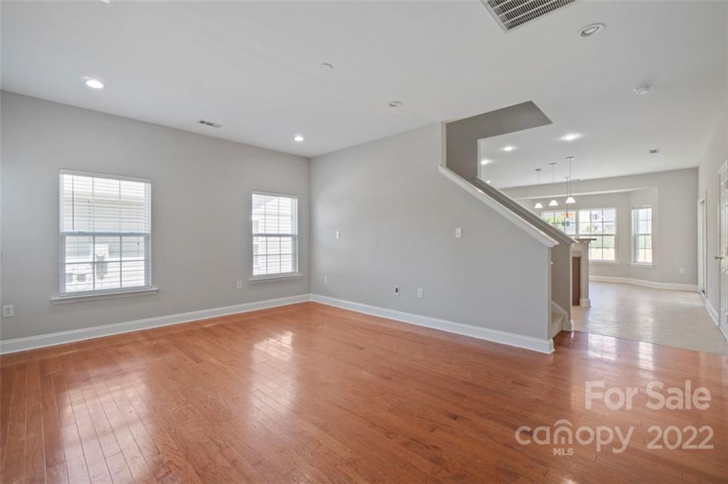 4416 Marys Point Road Monroe, NC 28110 - Photo 14 of 33 a view of an empty room with glass door and windows