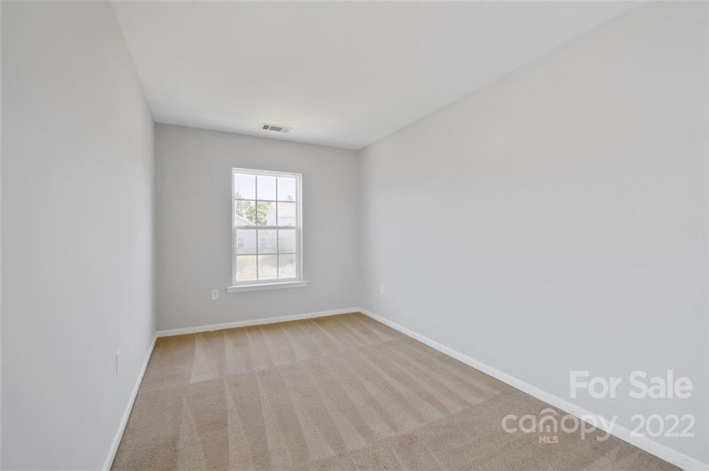 4416 Marys Point Road Monroe, NC 28110 - Photo 17 of 33 a view of an empty room with a window