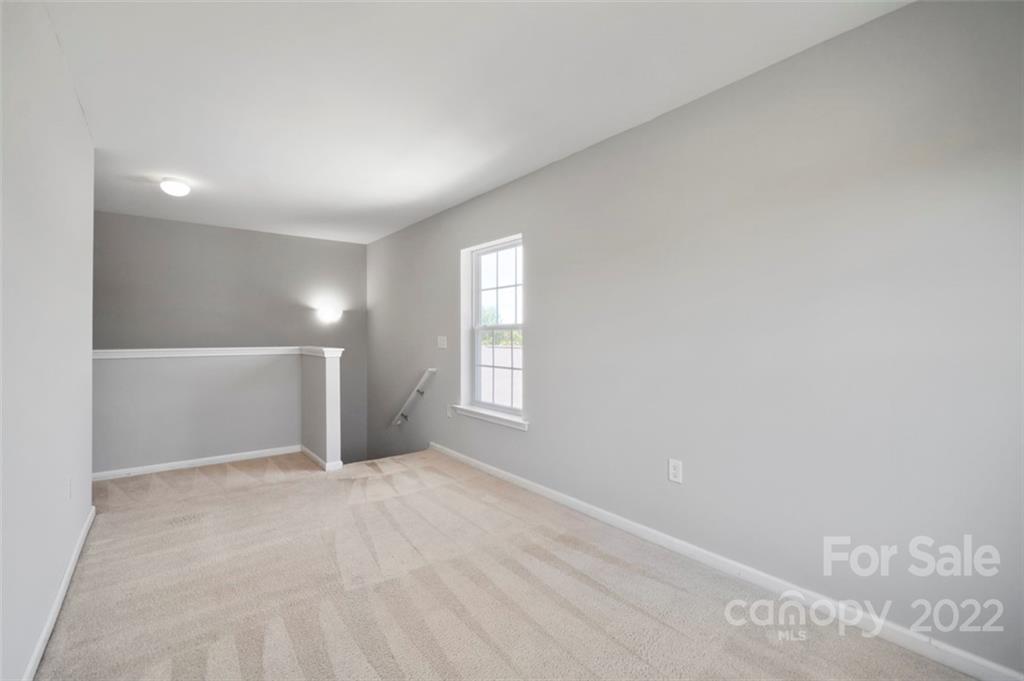 4416 Marys Point Road Monroe, NC 28110 - Photo 18 of 33 a view of an empty room with a window