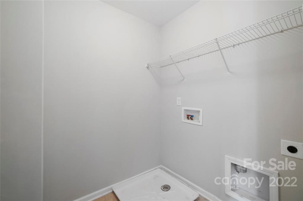 4416 Marys Point Road Monroe, NC 28110 - Photo 19 of 33 a bathroom with a sink and vanity
