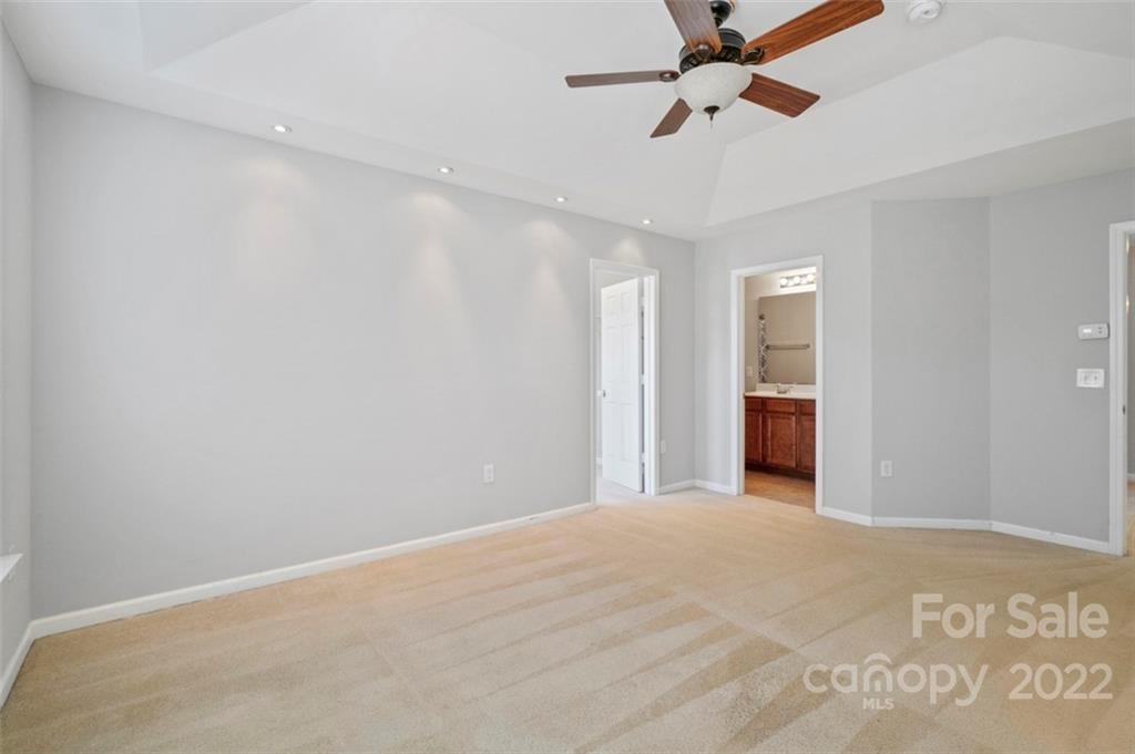 4416 Marys Point Road Monroe, NC 28110 - Photo 27 of 33 a view of a room with a ceiling fan