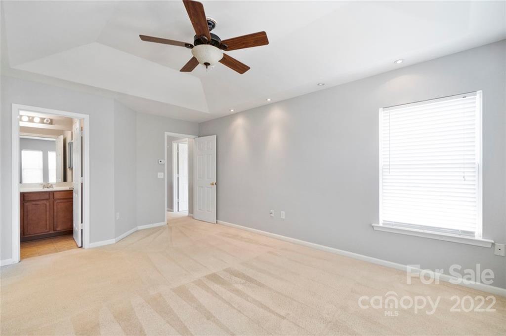 4416 Marys Point Road Monroe, NC 28110 - Photo 28 of 33 a view of a room with a ceiling fan and window