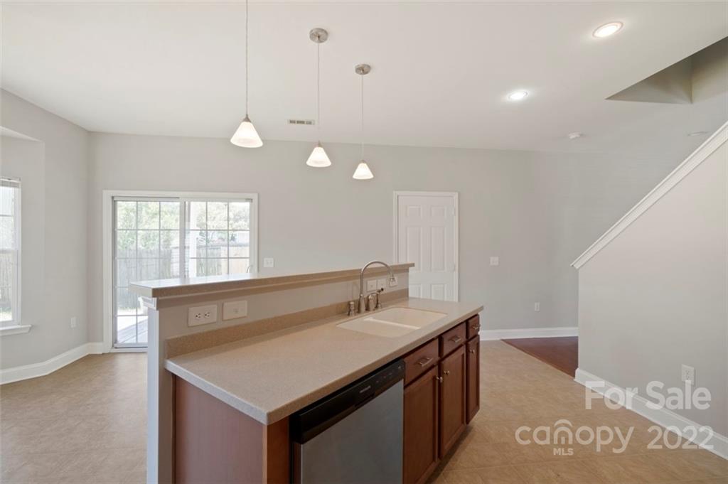 4416 Marys Point Road Monroe, NC 28110 - Photo 9 of 33 a bathroom with a sink a vanity and a mirror