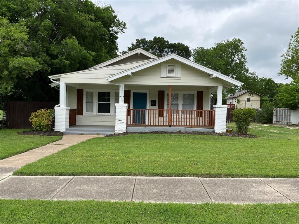 2809 Carter Avenue Fort Worth, TX 76103 - Photo 1 of 1 a front view of a house with a yard