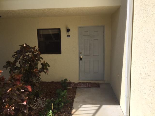 6547 Southeast Federal Highway, Unit 101 Stuart, FL 34997 - Photo 3 of 8 6547 front door