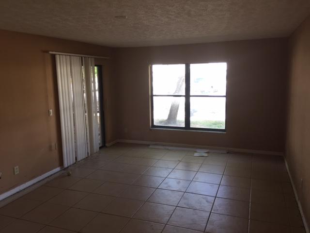 6547 Southeast Federal Highway, Unit 101 Stuart, FL 34997 - Photo 6 of 8 6547 living 2