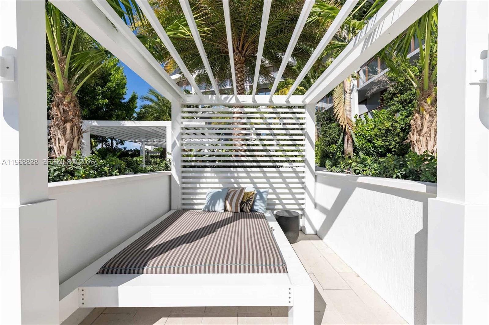 3900 Alton Road, Unit 318 Miami Beach, FL 33140 - Photo 9 of 42 a view of balcony with wooden floor