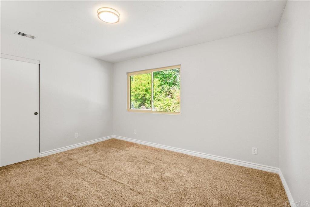 485 Wax Flower Lane Fallbrook, CA 92028 - Photo 19 of 31 an empty room with window