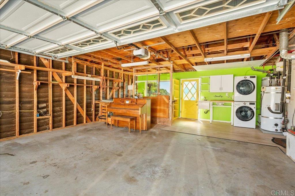 485 Wax Flower Lane Fallbrook, CA 92028 - Photo 30 of 31 a view of a garage with blue painted wall