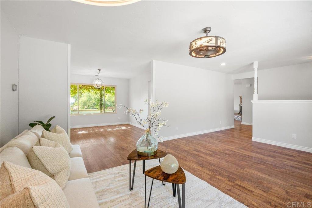 485 Wax Flower Lane Fallbrook, CA 92028 - Photo 9 of 31 a living room with furniture and a window