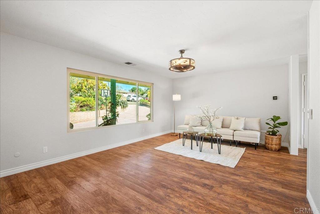 485 Wax Flower Lane Fallbrook, CA 92028 - Photo 10 of 31 a living room with furniture and a window