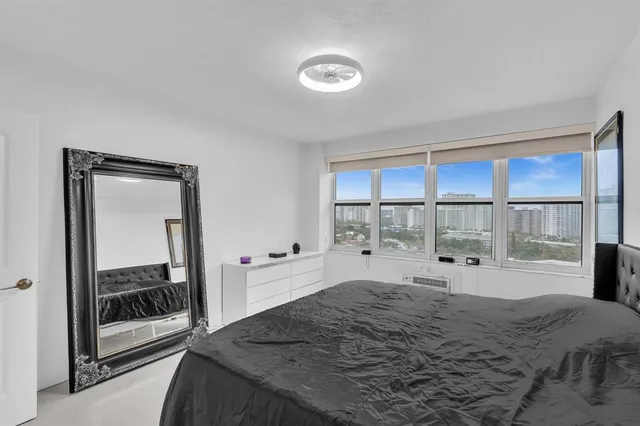 a view of a workspace with furniture