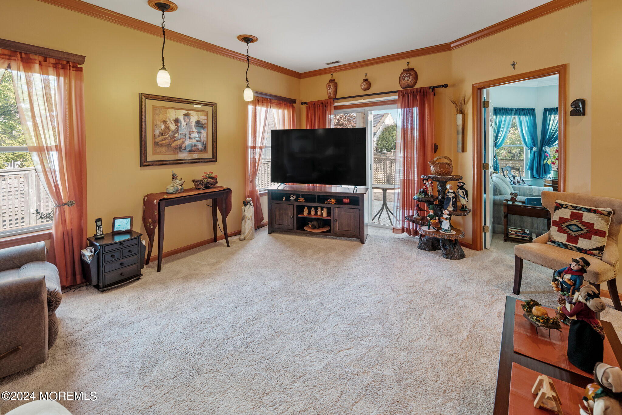 9 Hampton Road Manahawkin, NJ 08050 - Photo 12 of 50 a living room with furniture and a flat screen tv
