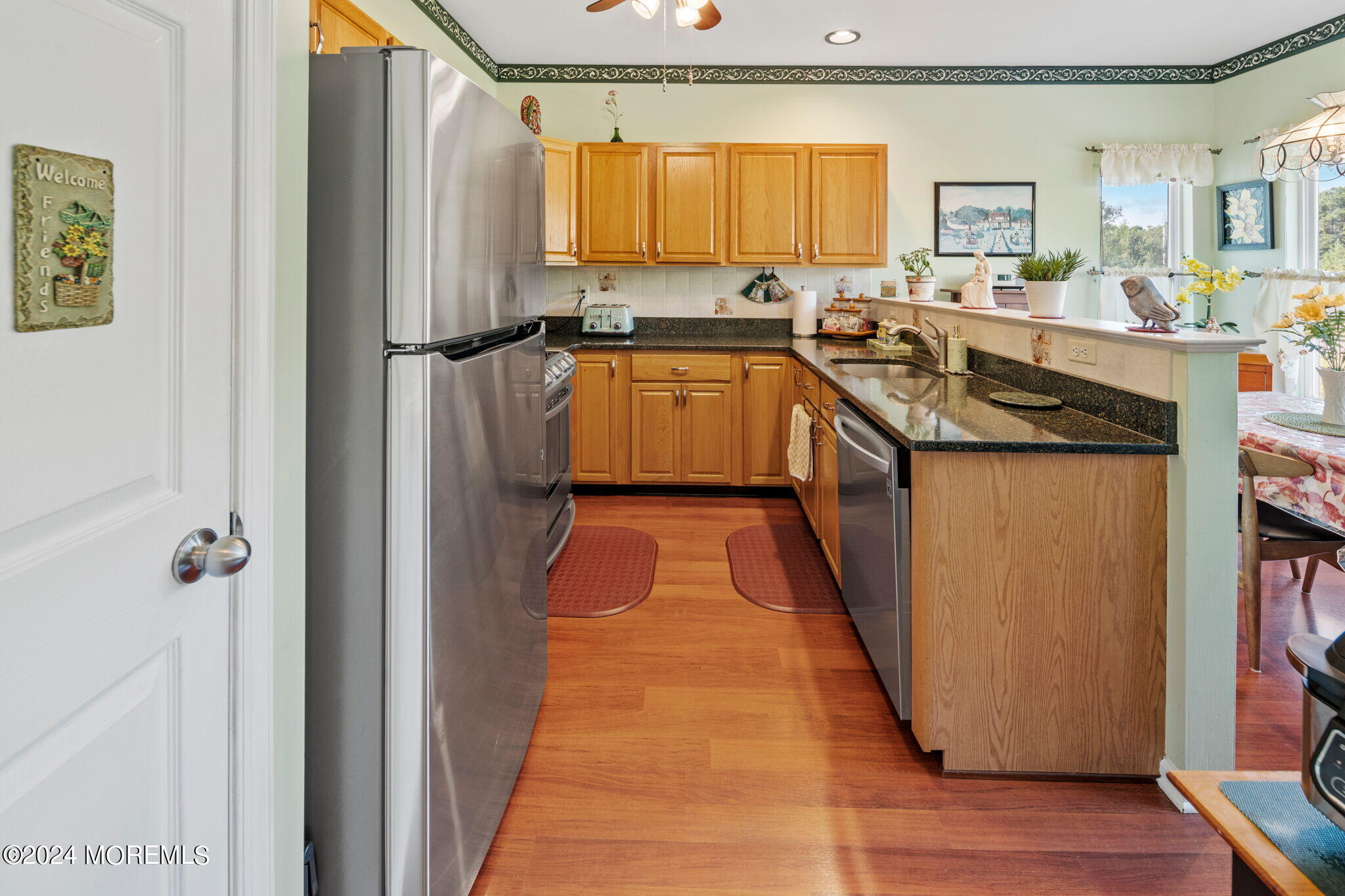 9 Hampton Road Manahawkin, NJ 08050 - Photo 15 of 50 a kitchen with granite countertop a sink a counter top space and cabinets