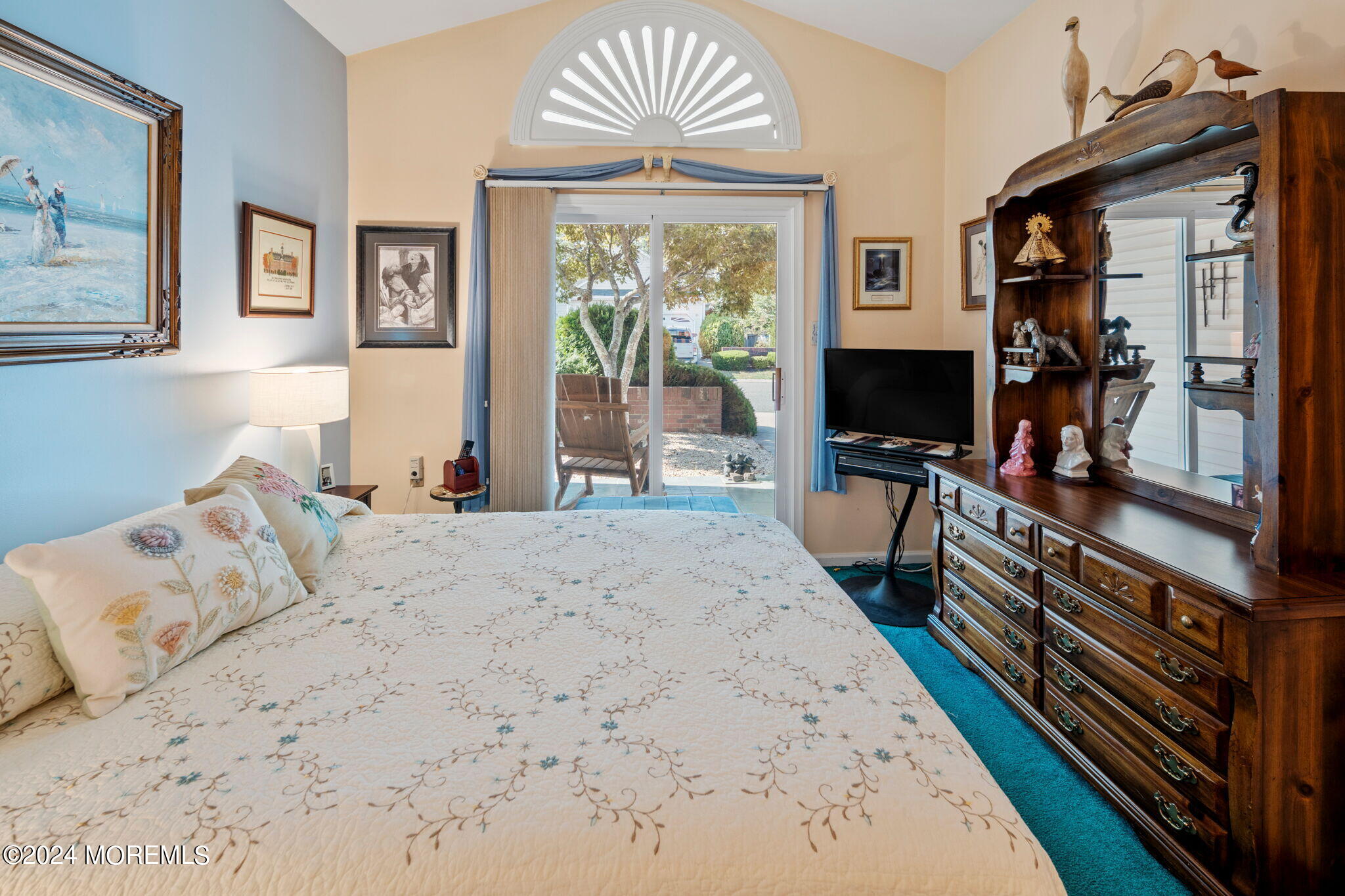 9 Hampton Road Manahawkin, NJ 08050 - Photo 23 of 50 a bedroom with a bed and a flat tv screen on dresser