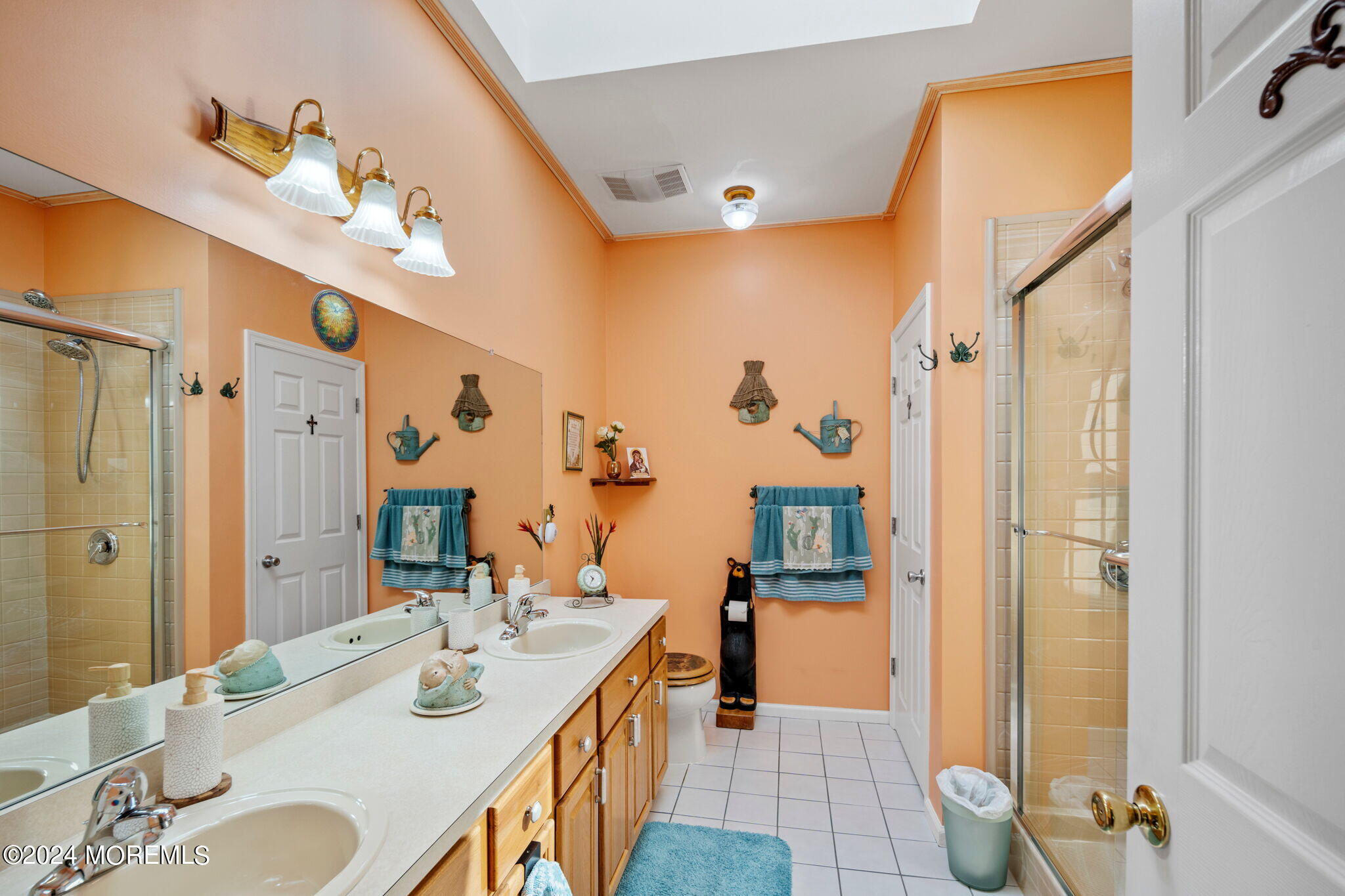 9 Hampton Road Manahawkin, NJ 08050 - Photo 27 of 50 a spacious bathroom with a double vanity sink mirror and shower