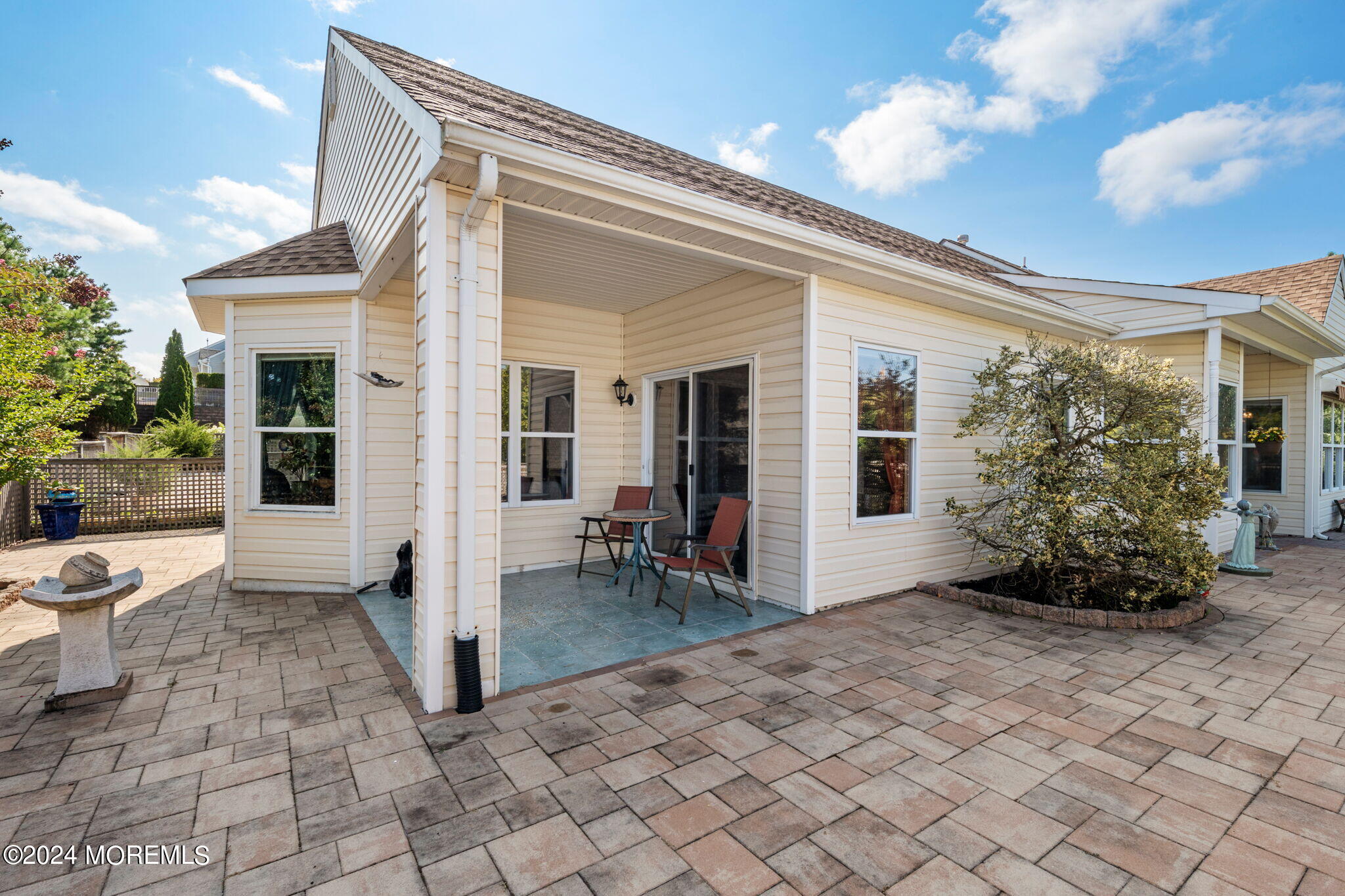 9 Hampton Road Manahawkin, NJ 08050 - Photo 32 of 50 a view of a porch with seating space