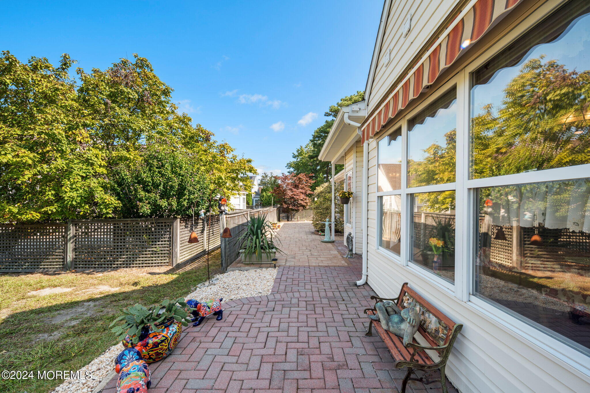 9 Hampton Road Manahawkin, NJ 08050 - Photo 36 of 50 a view of a pathway with a yard