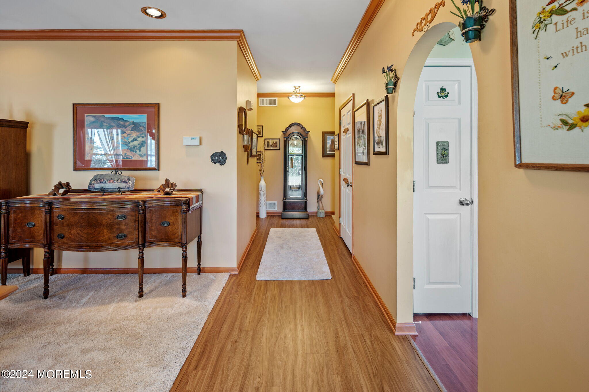 9 Hampton Road Manahawkin, NJ 08050 - Photo 7 of 50 a view of a bedroom with wooden floor and furniture