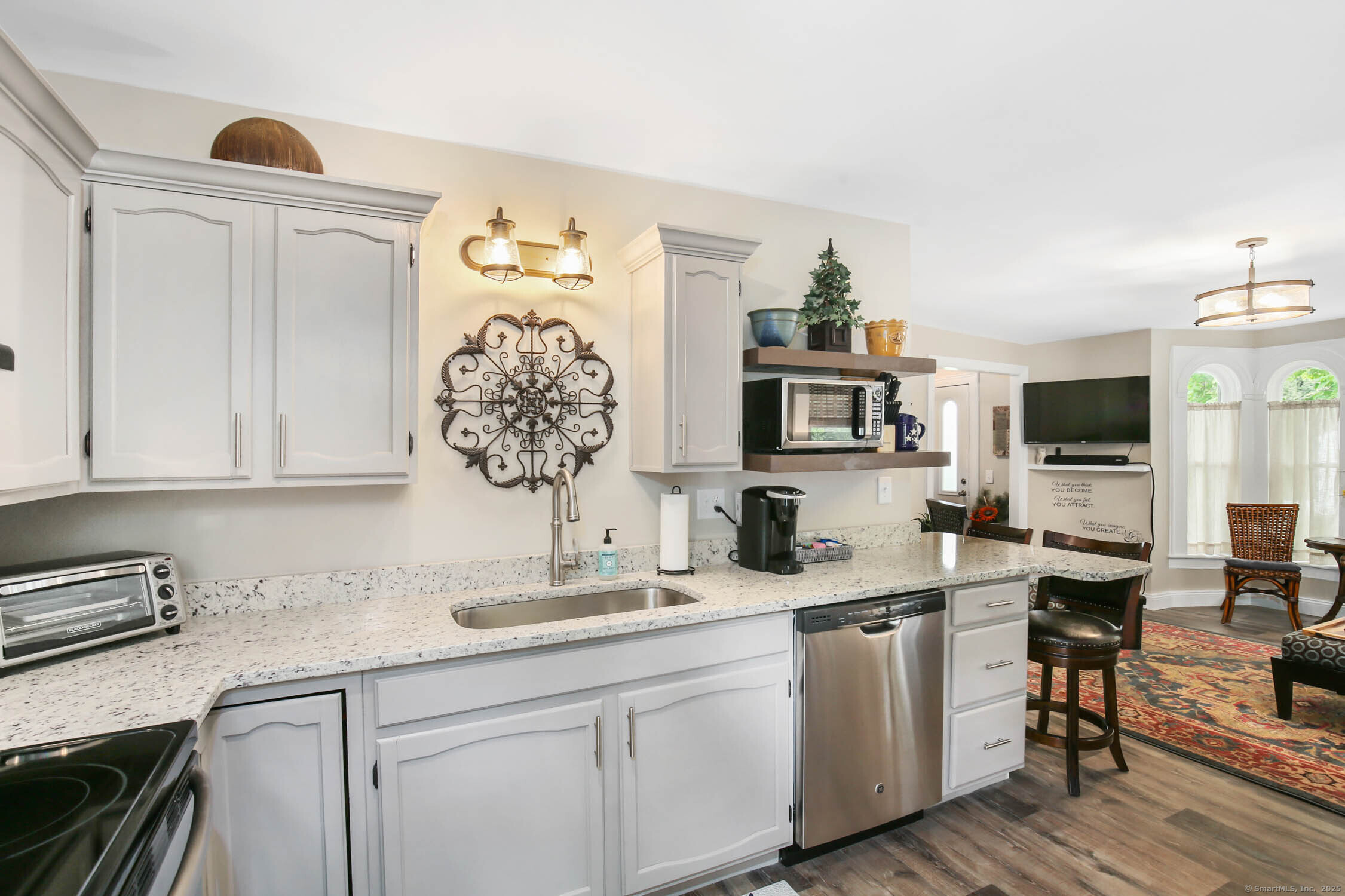 48 Wrights Crossing Road Pomfret, CT 06259 - Photo 12 of 34 a kitchen with a sink and a stove top oven