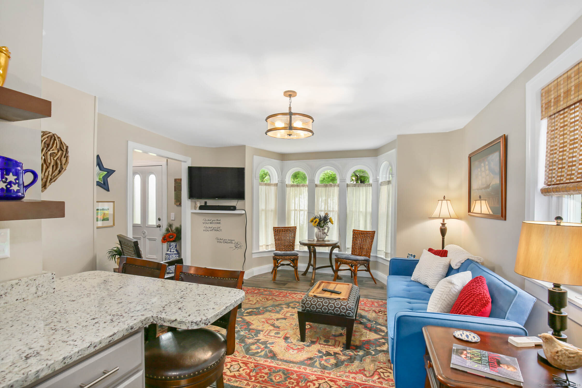 48 Wrights Crossing Road Pomfret, CT 06259 - Photo 13 of 34 a living room with furniture and a flat screen tv
