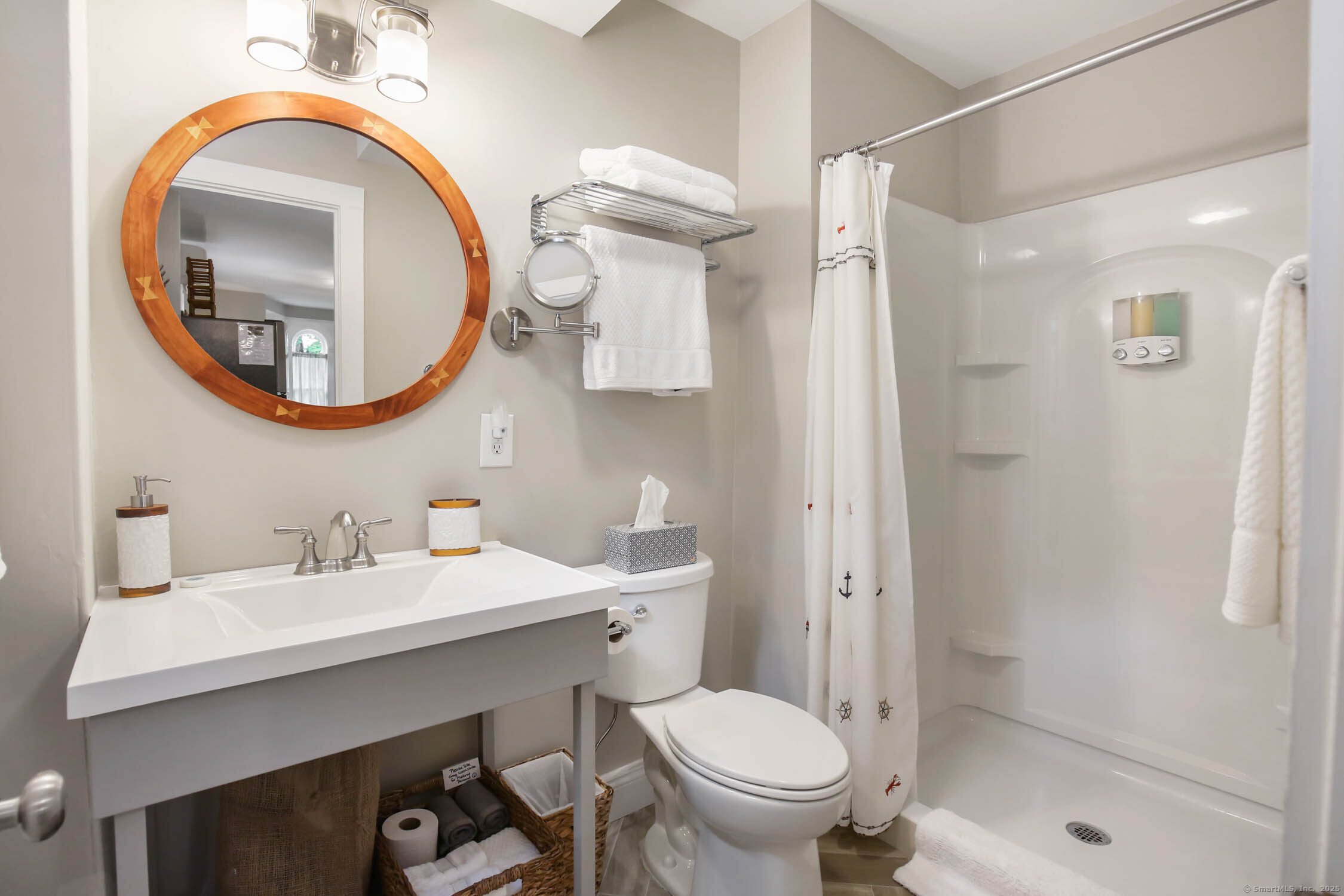 48 Wrights Crossing Road Pomfret, CT 06259 - Photo 19 of 34 a bathroom with a sink a toilet and a mirror