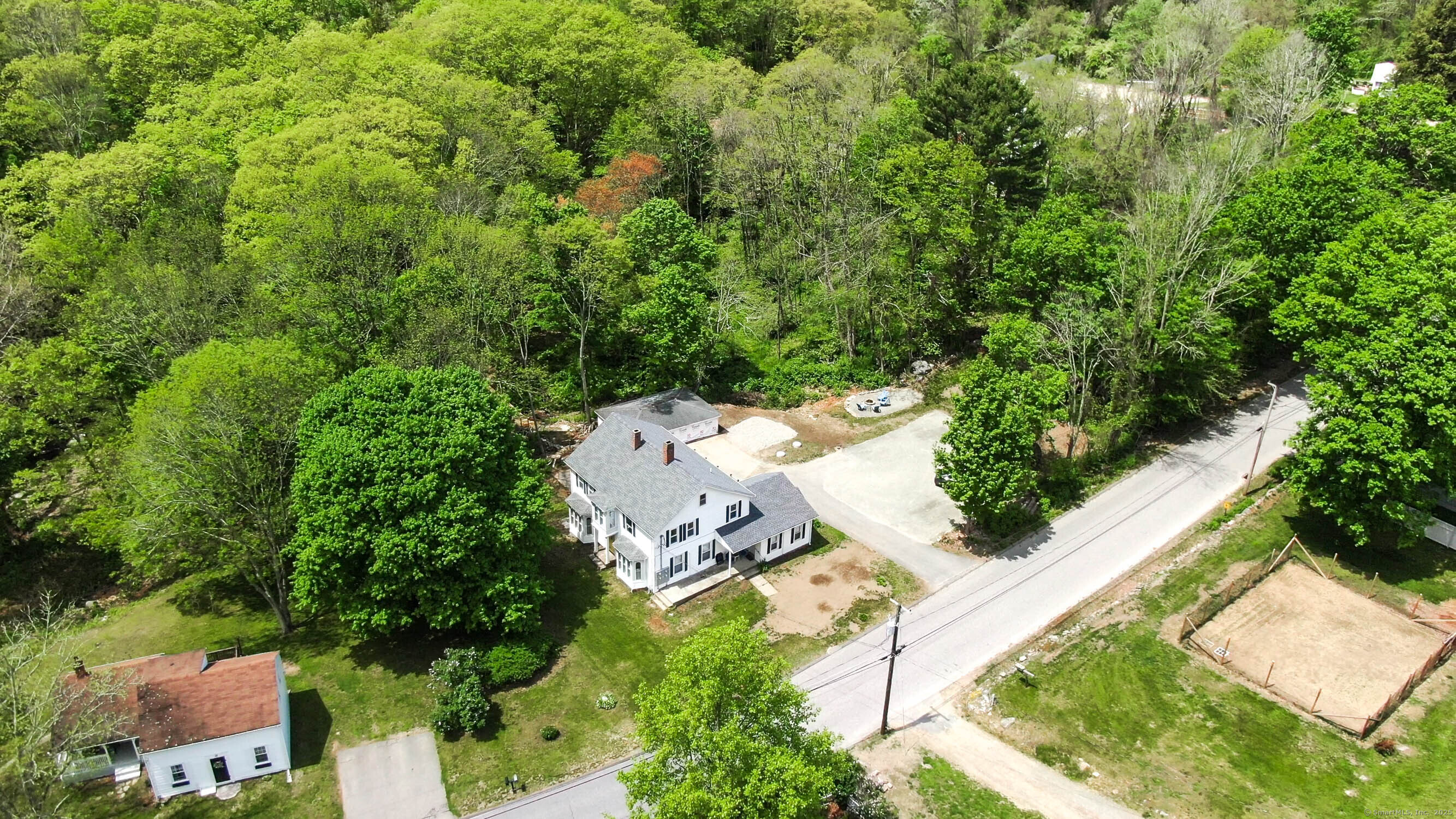48 Wrights Crossing Road Pomfret, CT 06259 - Photo 2 of 34 an aerial view of a house with yard