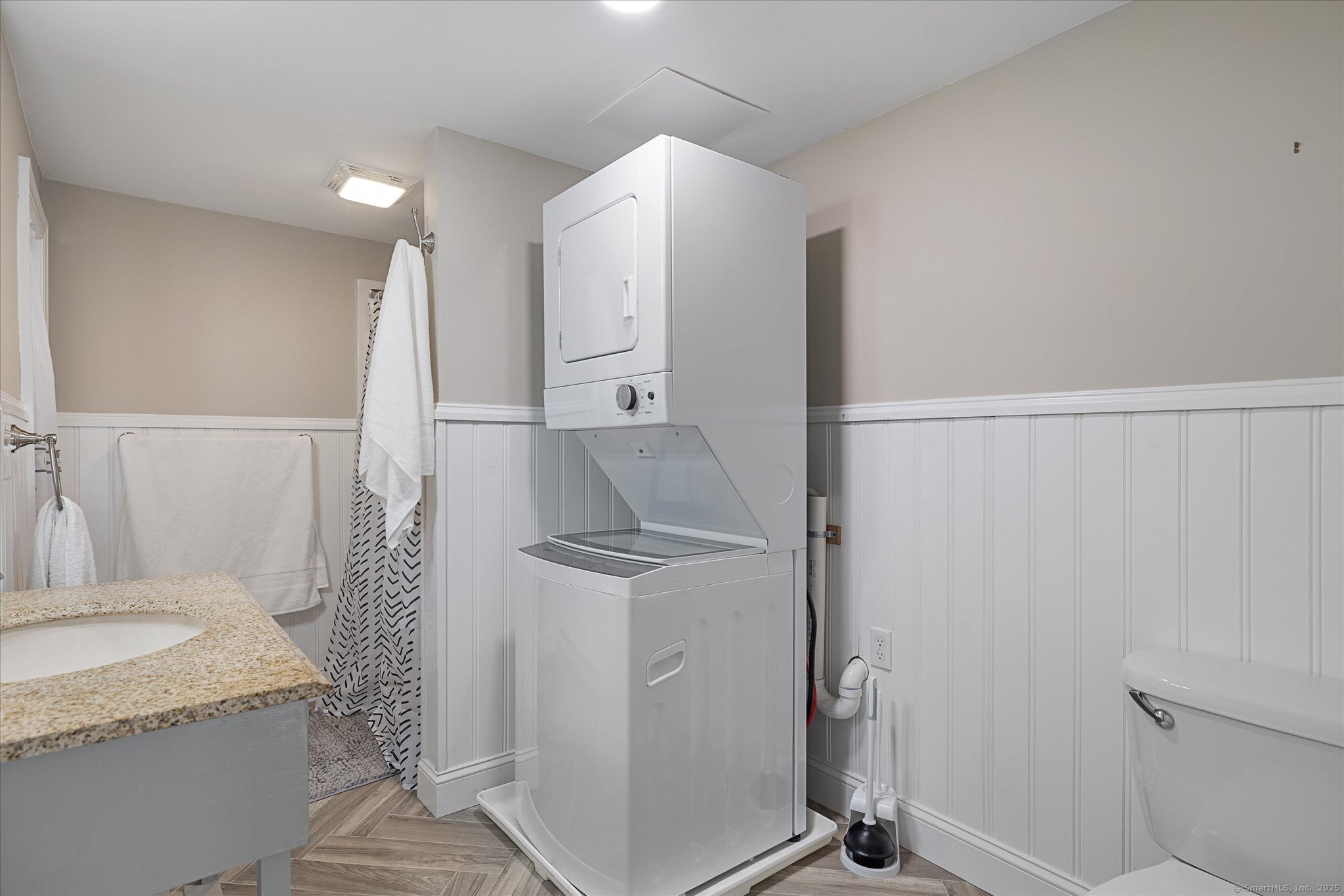 48 Wrights Crossing Road Pomfret, CT 06259 - Photo 25 of 34 a bathroom with a granite countertop sink and a mirror