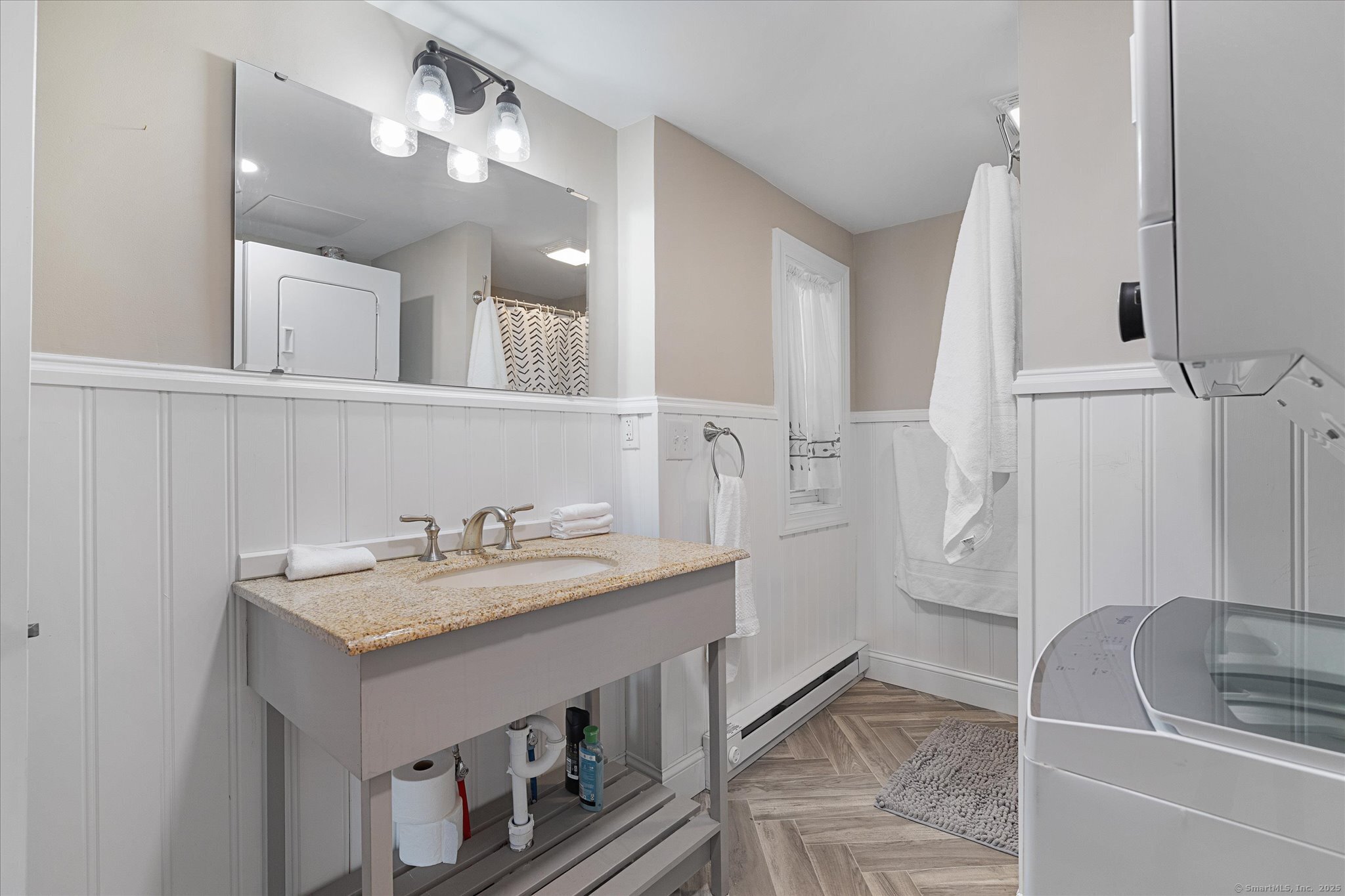 48 Wrights Crossing Road Pomfret, CT 06259 - Photo 26 of 34 a bathroom with a sink and a mirror