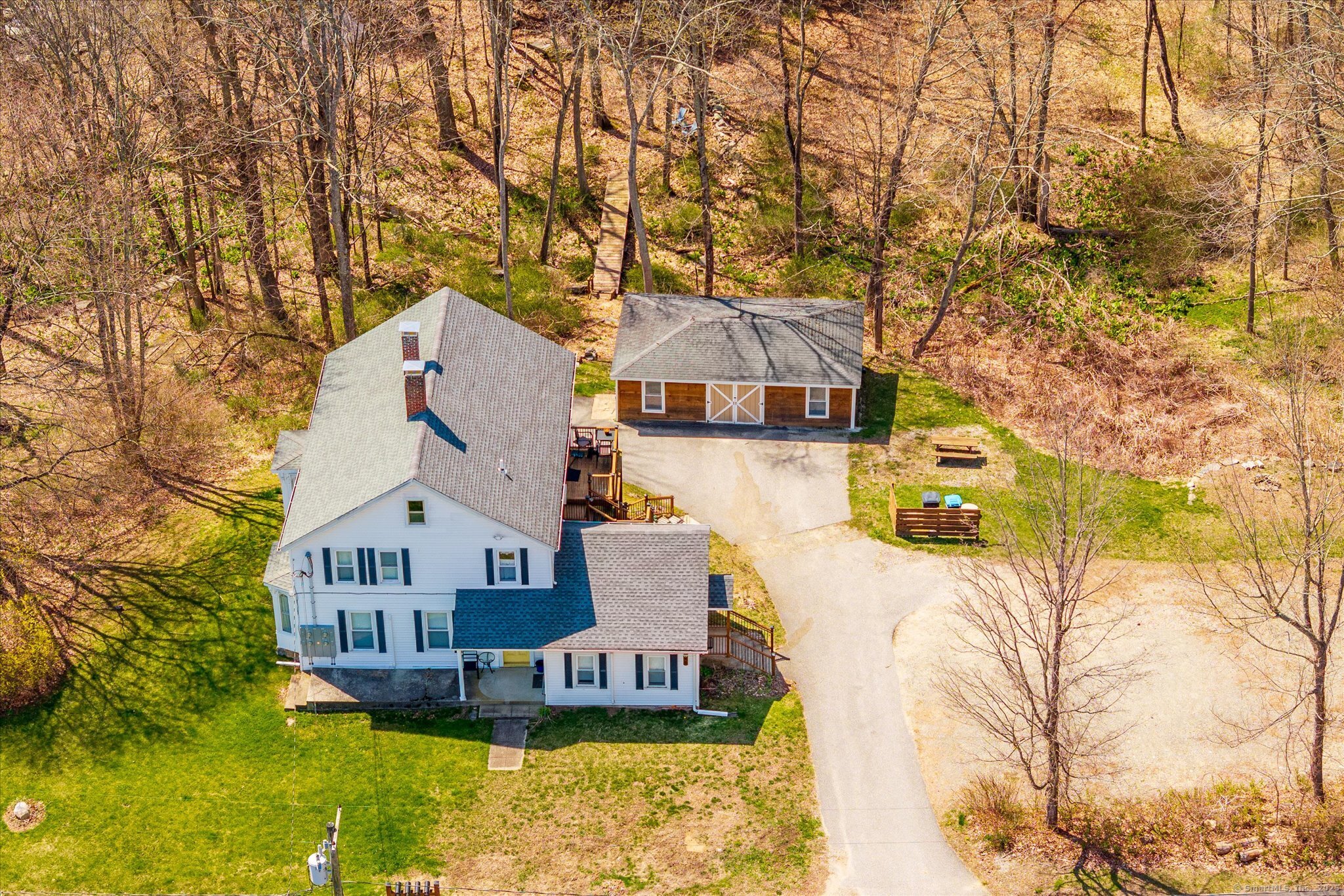 48 Wrights Crossing Road Pomfret, CT 06259 - Photo 33 of 34 a view of a house with a yard and large trees