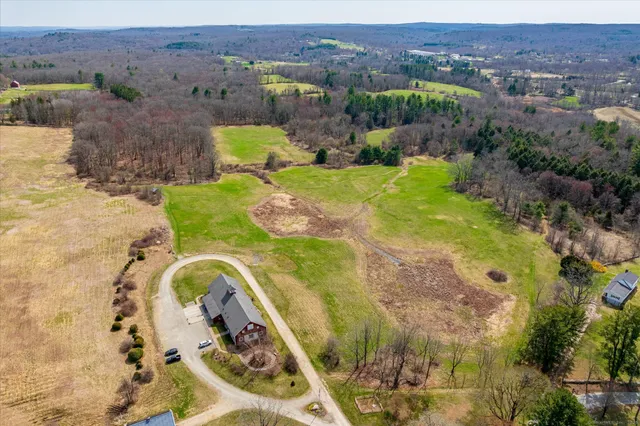 a view of a swimming pool with a lake view