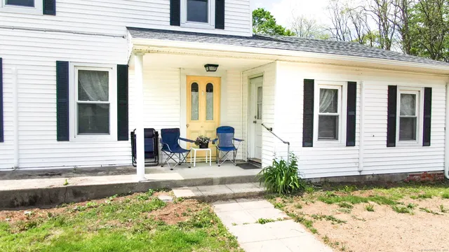 a front view of a house with patio