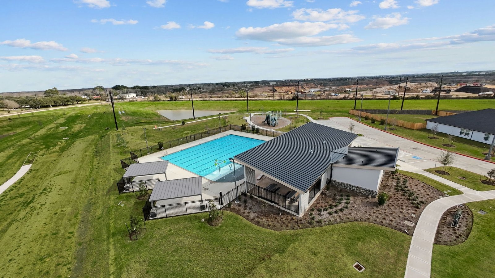 4520 Highland Oaks Court Rosenberg, TX 77469 - Photo 37 of 48 an aerial view of a house with a garden and lake view